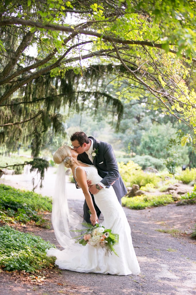 "I love this photo of Michelle and Ryan with the trees circling around them and the romantic kiss from the groom to the bride.  They had this embrace right after they saw each other for the first time on their wedding day." — Erin Johnson