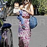 What's prettier for running errands than a flowy maxi in a gorgeous all-over floral print? The dress has a unique, antique feel, but Miranda gave it a modern update with an oversize tote, metallic sandals, and classic aviators.