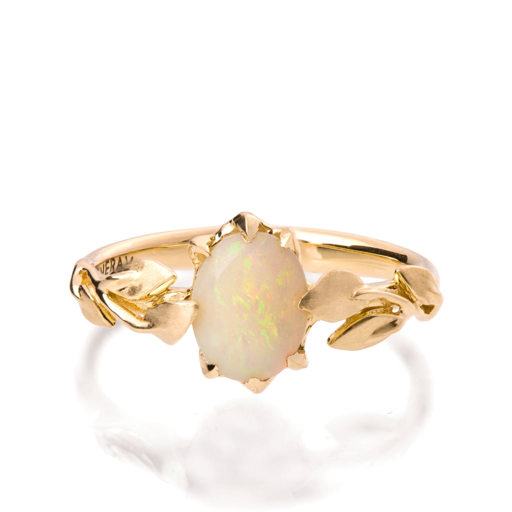 Beautifully quaint is how we would describe an opal engagement ring ($950) with a leaf band.