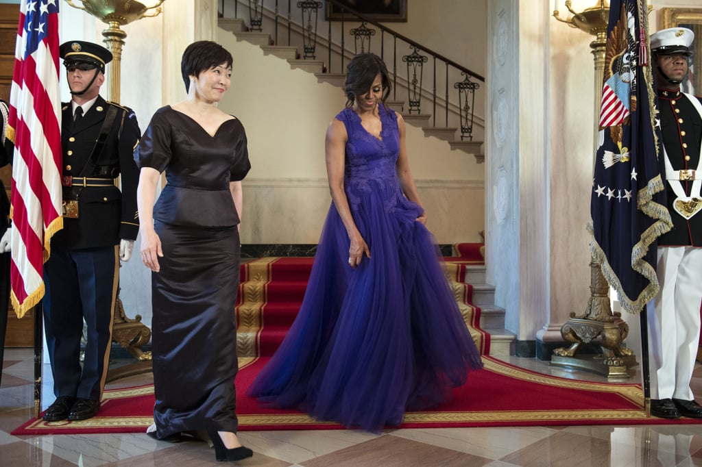 The gown looked even better when it moved, as the first lady made her way down the stairs.