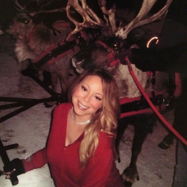 Mariah Carey posed with real reindeer.