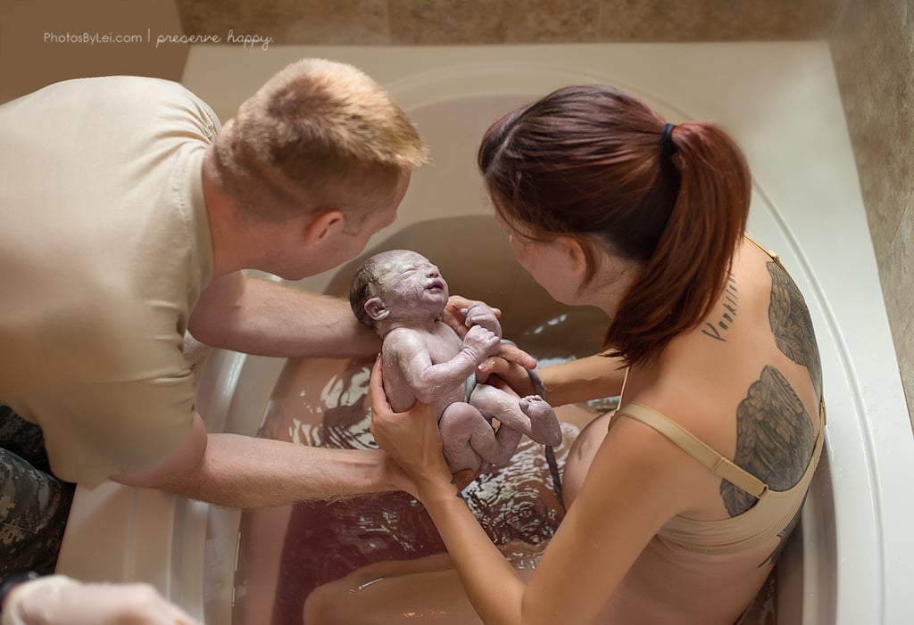 "Every now and then, birth happens so quickly there is no time for a birth tub! In this case, mama knew she needed water, so she gave birth in her bathtub. I photographed it from inside the shower stall!"