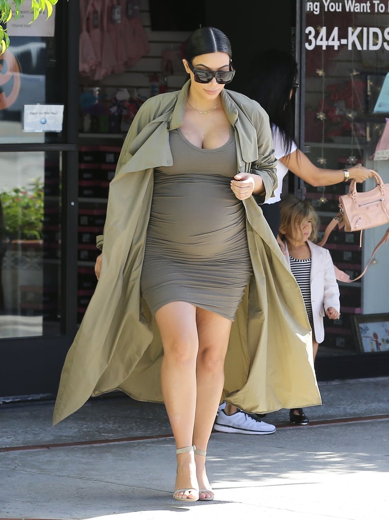 Kim was seen picking up North from dance class in a supershort dress, which she paired with her signature duster coat and a pair of heels.