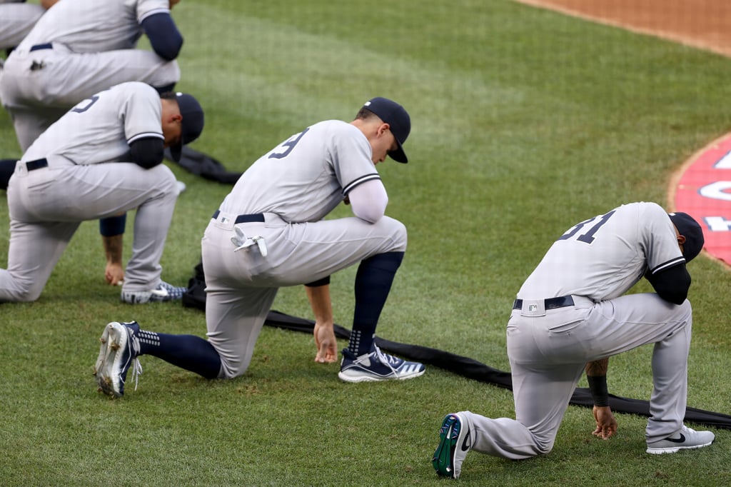 See MLB Players Kneel For Racial Justice on Opening Day