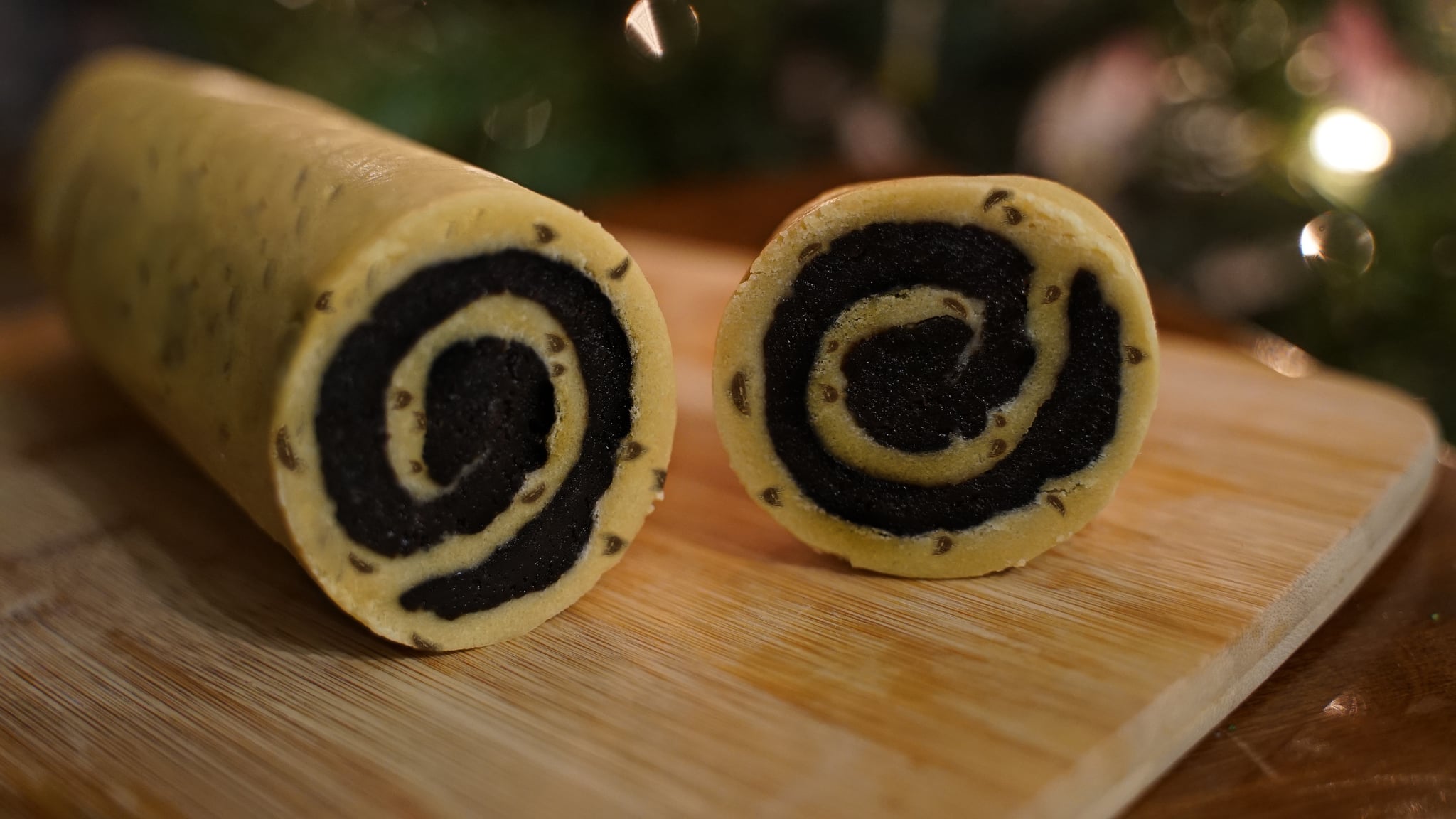 chocolate chip cookie and brownie rolled into a log