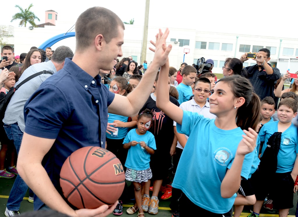 At an event in Miami in April 2014, Andrew played basketball with elementary school students.