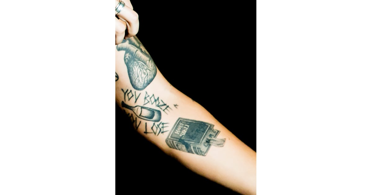 A small traditional style tattoo of a liquor bottle  Bottle tattoo  Traditional style tattoo Small traditional tattoo