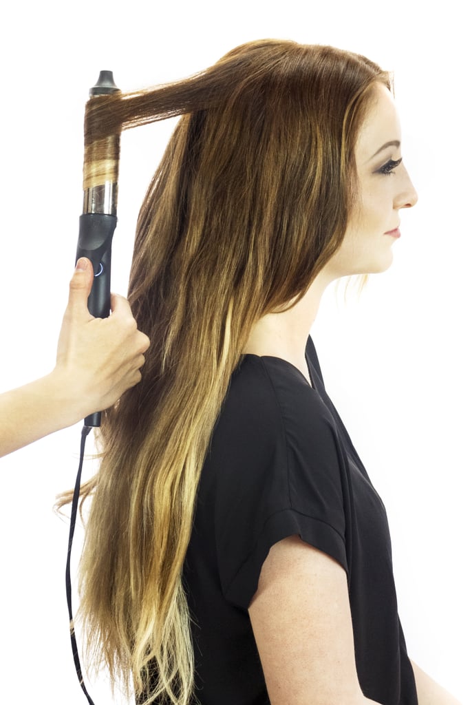 Starting about three-quarters of the way up your strands, loosely curl all your hair using a curling iron like GHD Curve Soft Curl Iron ($199). There's no need to be careful about the size of the sections or direction of the ringlet! This style will look cooler if it's a bit messy.