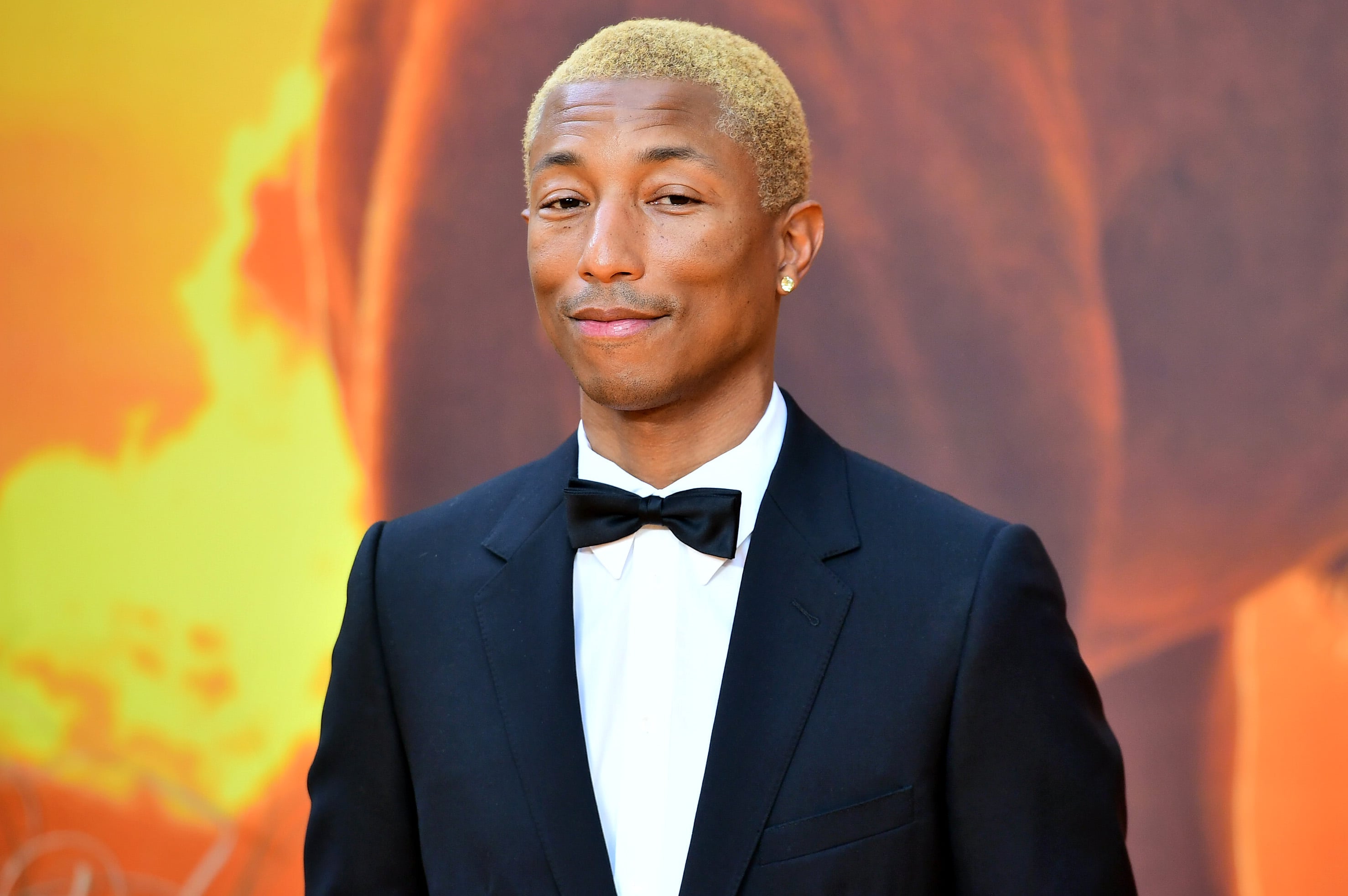 The Lion King: Pharrell Williams joined by his wife Helen Lasichanh at  London premiere