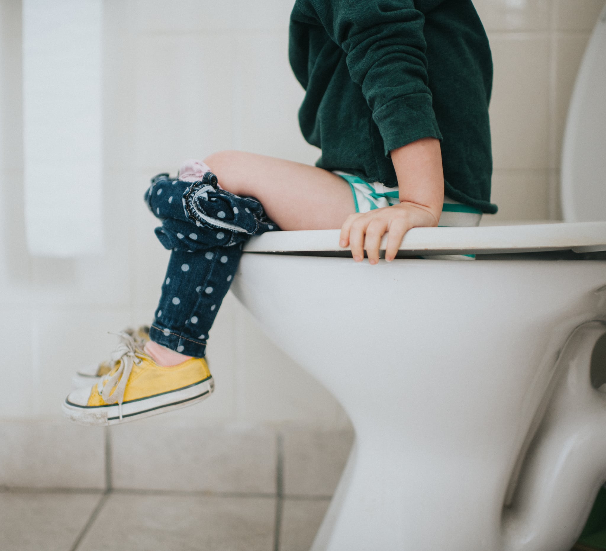 Small child on a toilet