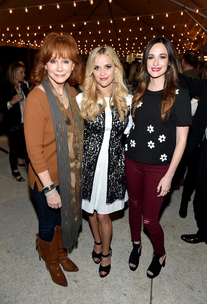 As did Reba McEntire, who wore a long scarf and fringe boots, and singer Kacey Musgraves in a floral shirt.