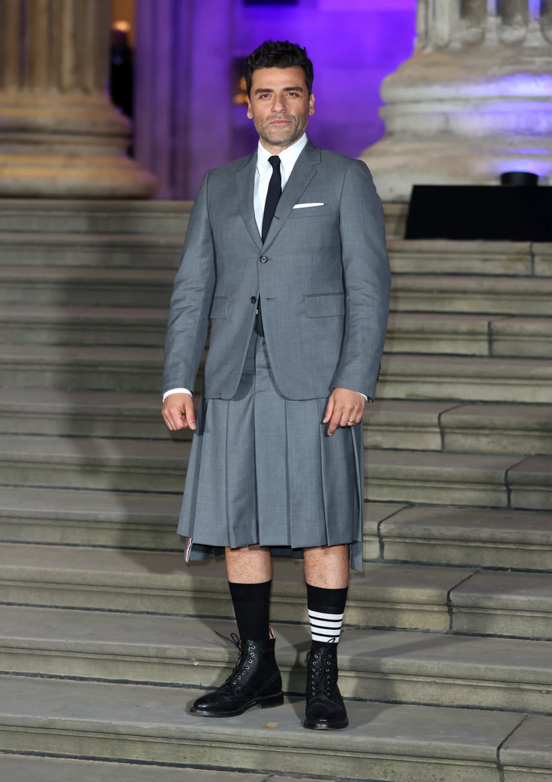 Oscar Isaac in a Thom Browne Skirt Suit at a Moon Knight Premiere in London on March 17