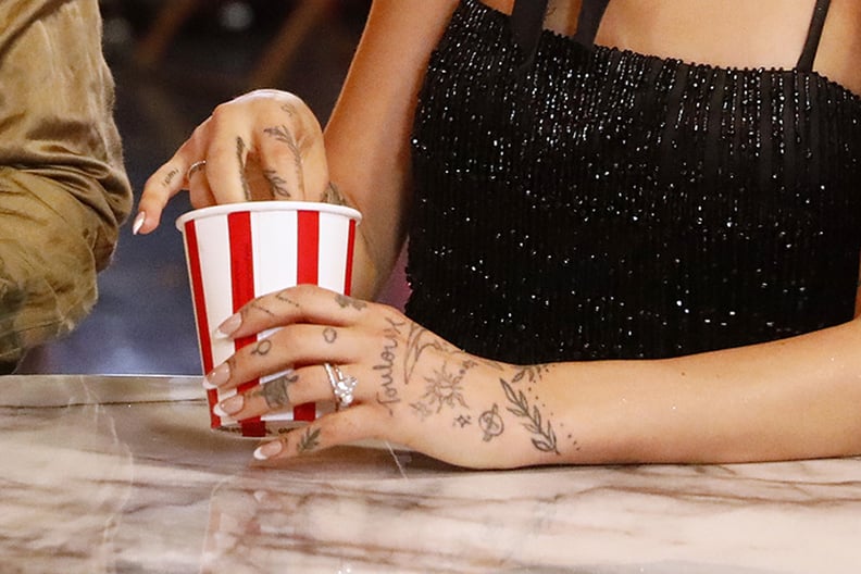 Ariana Grande's "Toulouse" Hand Tattoo