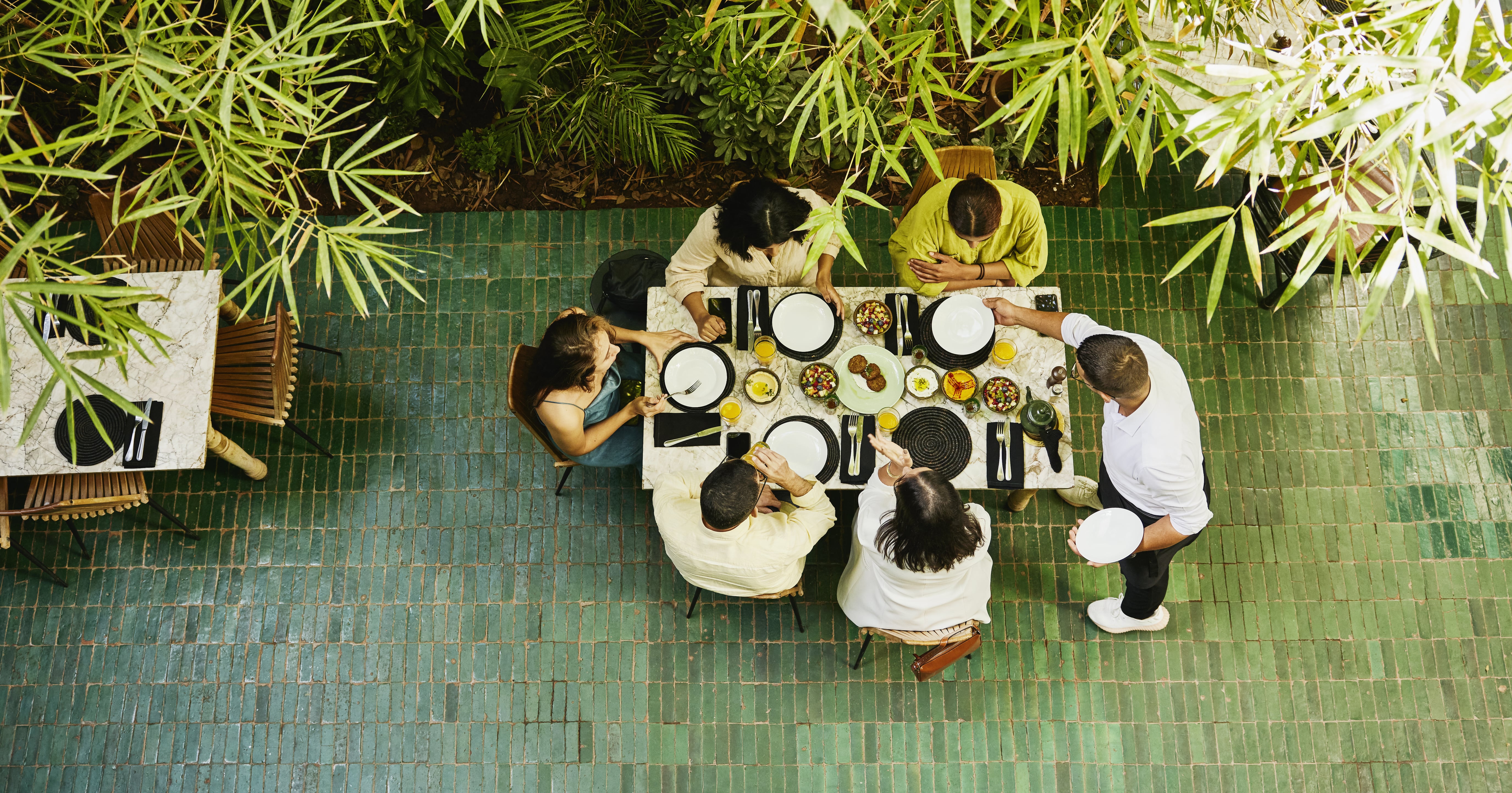 Dining Out While in Debt: Financial Experts Weigh In