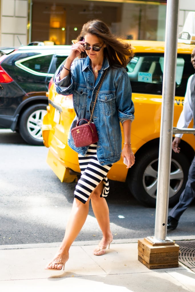 Sure, Breton stripes, a jean jacket, and red accessories have been done before, but Katie upgrades the formula with of-the-moment heeled flip-flop sandals.