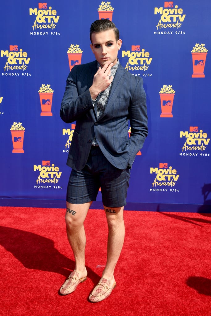 Nico Tortorella arrived at the MTV Movie and TV Awards in full glam, and we couldn't be more excited. The 30-year-old actor, who is best known for playing Josh on TV Land's Younger opposite Sutton Foster and Hilary Duff, walked the red carpet in what appears to be foundation, cobalt-blue eyeliner, and false eyelashes. 
The actor arrived and took photos with YouTube personality Manny Gutierrez, who had previously mentioned in a video that he was doing makeup for a celebrity for the awards and joining them as their date. A representative for the influencer has confirmed that he was responsible for Tortorella's look. 
Check out his makeup look ahead.

    Related:

            
            
                                    
                            

            40 Hot Pictures of Nico Tortorella, That Total Babe From Younger