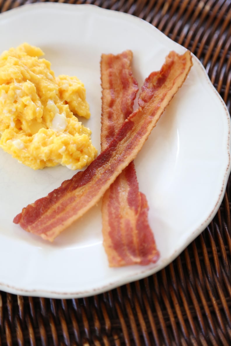 Scramble eggs in bacon fat.