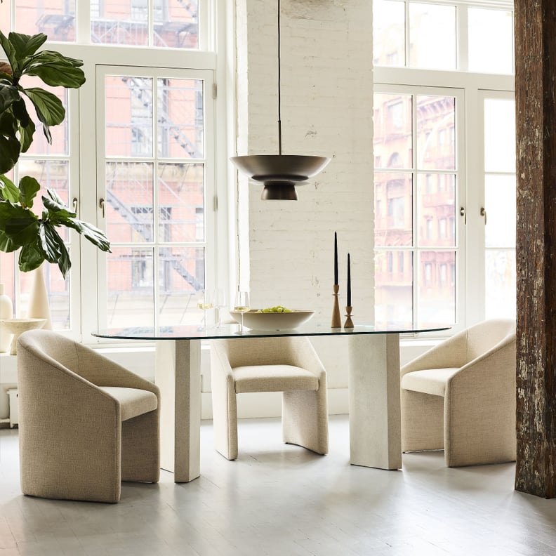 A Glass Top Dining Table From West Elm