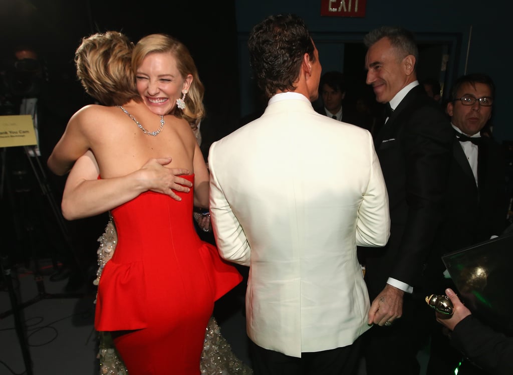 Jennifer Lawrence hugged winner Cate Blanchett backstage after presenting Matthew McConaughey with his best actor statue.