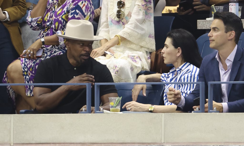Jamie Foxx (left) chats with Julianna Margulies at the US Open on Sept. 9.