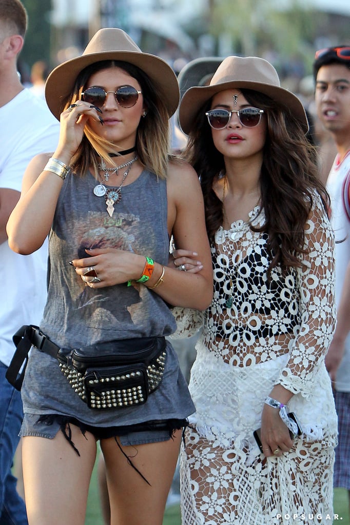 Selena Gomez held Kylie Jenner's arm.