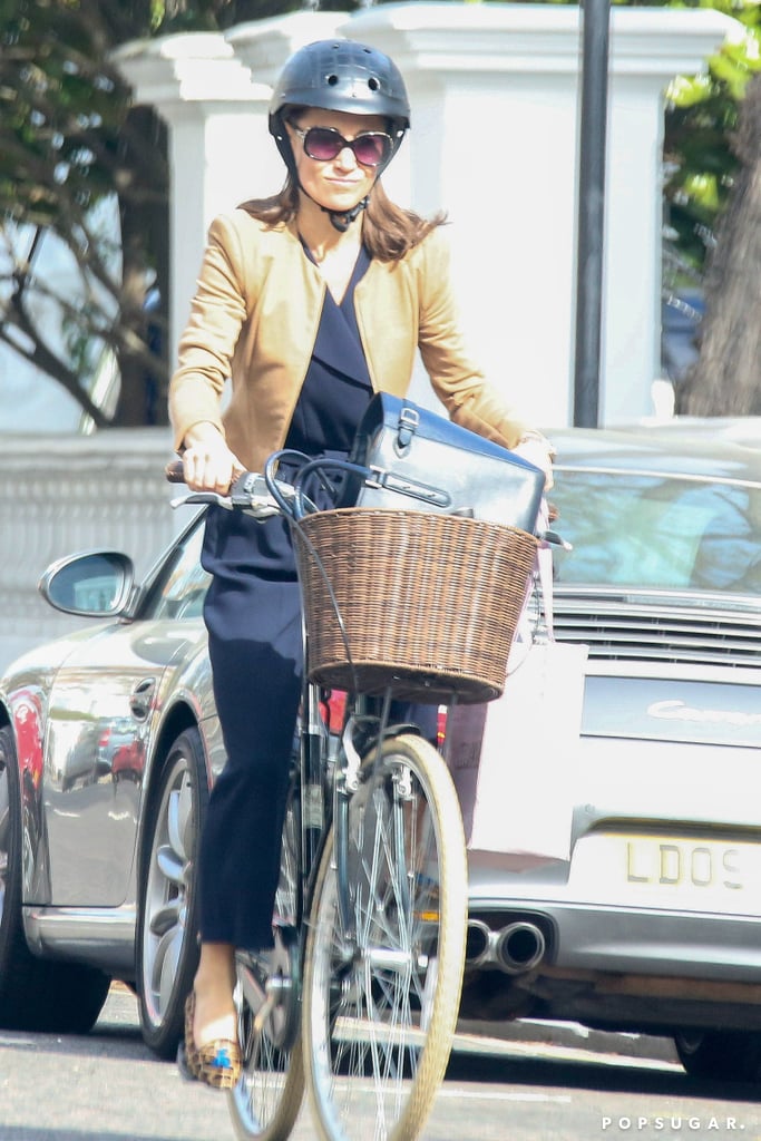Pippa Middleton Black Jumpsuit Riding a Bike