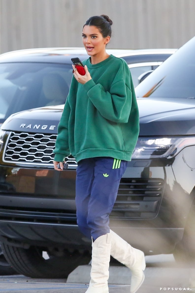 Kendall Jenner Wearing Cowboy Boots and Track Pants in LA in 2019