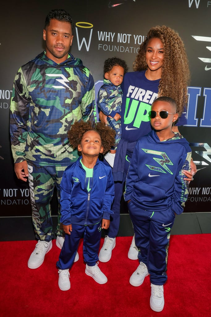 Ciara and Russell Wilson turned the launch of his 3Brand clothing line into a family affair! On Thursday, the couple hit the red carpet in New York City with their three kids: 7-year-old Future Jr., whom Ciara shares with ex Future; 4-year-old Sienna; and 11-month-old Win. The family coordinated their outfits and took turns striking their best poses for the cameras. The event also doubled as little Win's red carpet debut!
The family's fun-filled appearance comes amid Ciara and Russell's recent partnership with diaper brand All Good's #NewOriginals social initiative, which aims to donate up to 10 million diapers to families in need by the end of 2021. "There's nothing better than knowing that you're giving back, but also good when you think about the babies and just how precious they are," Ciara told POPSUGAR. See more of the family's night out ahead! 

    Related:

            
            
                                    
                            

            Ciara&apos;s Number 1 Tip For a Successful Disneyland Trip With 3 Kids Is Pretty Simple