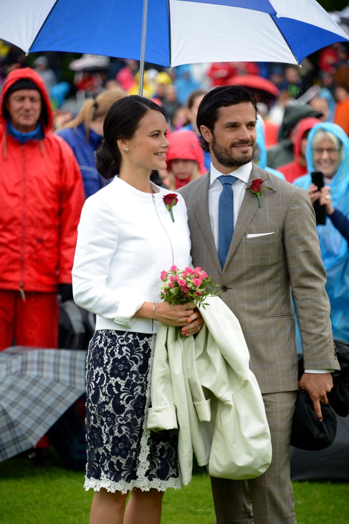 He held up an umbrella for Sofia at Crown Princess Victoria's birthday celebration in July 2014.