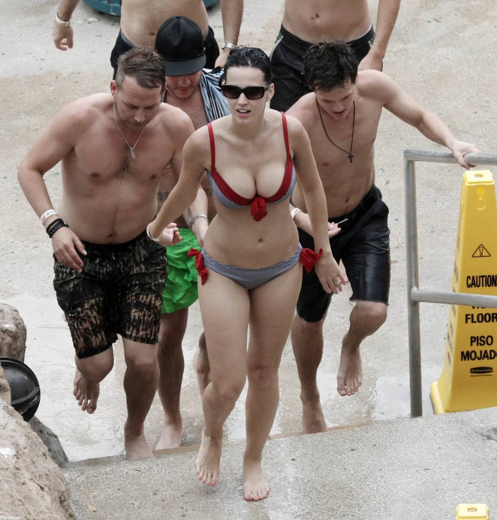 Katy hit the beach in the Bahamas in July 2010 wearing a bikini with red ties.