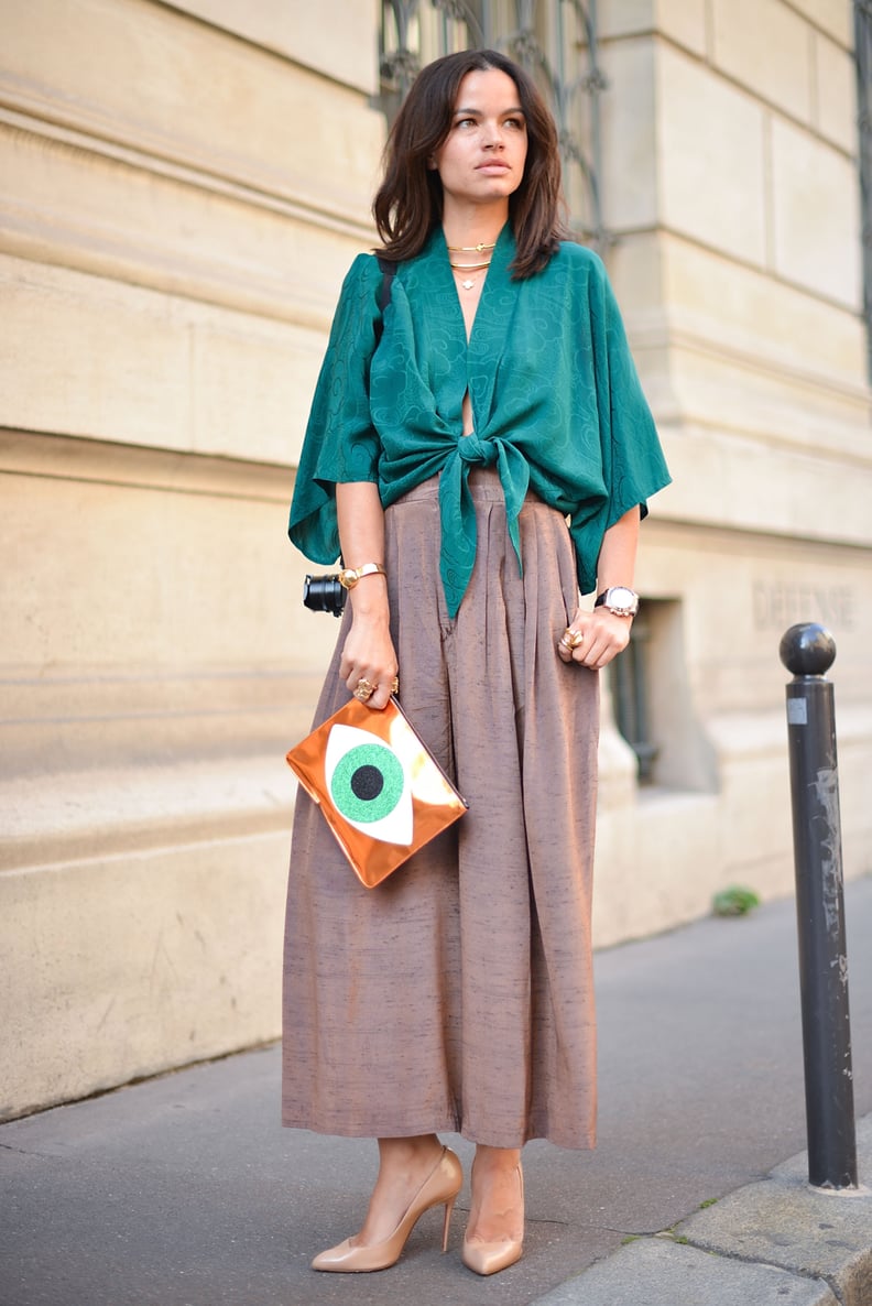 A loosely tied top over culottes