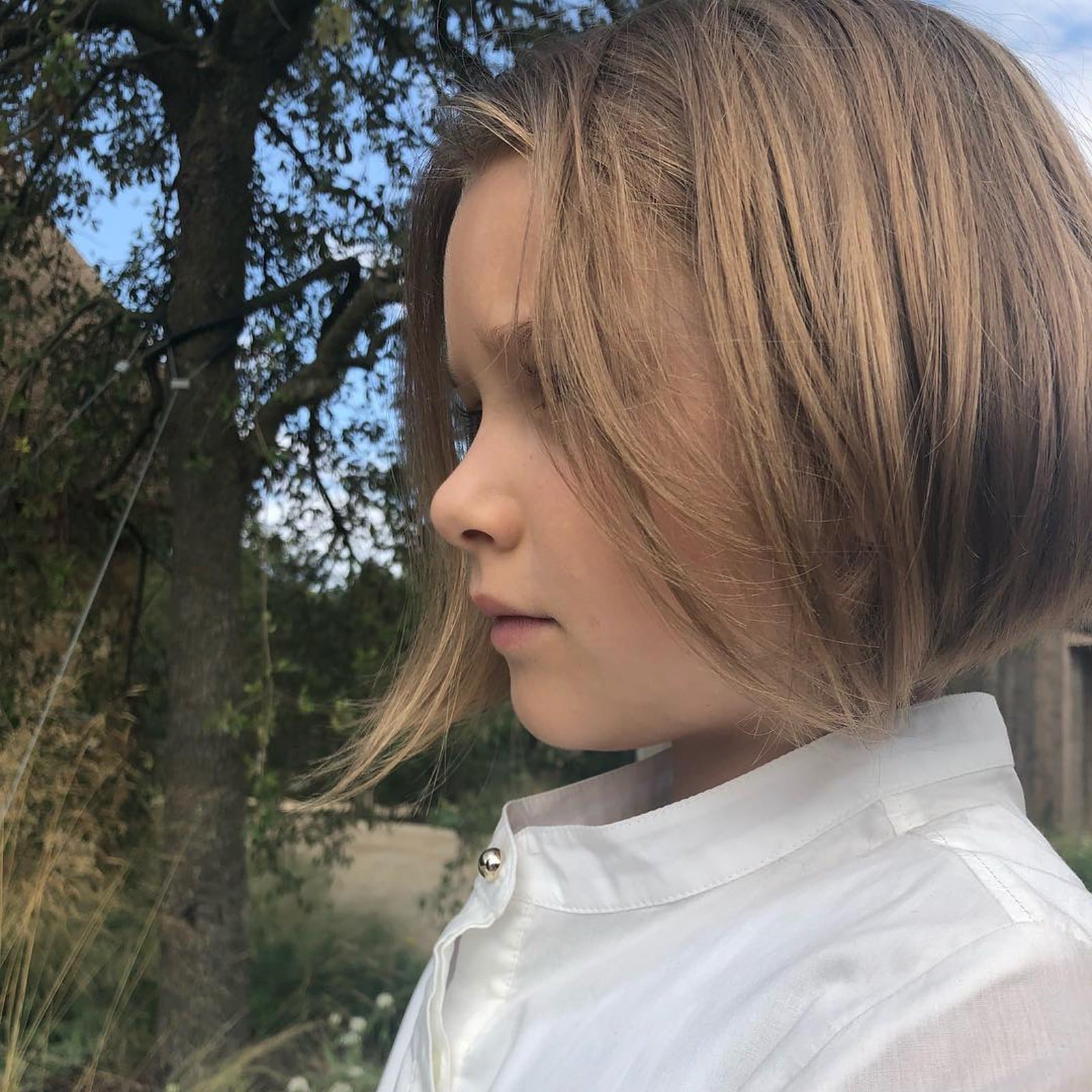 Victoria Beckham's carefree pixie cut with ends upon the nape