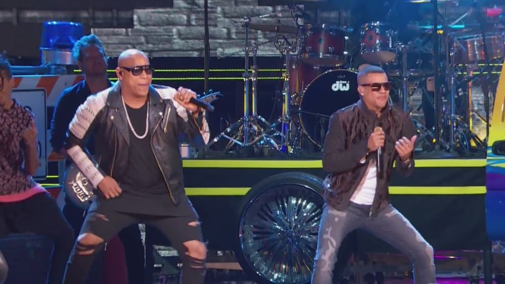 Gente de Zona Performing a Medley of Their Hits