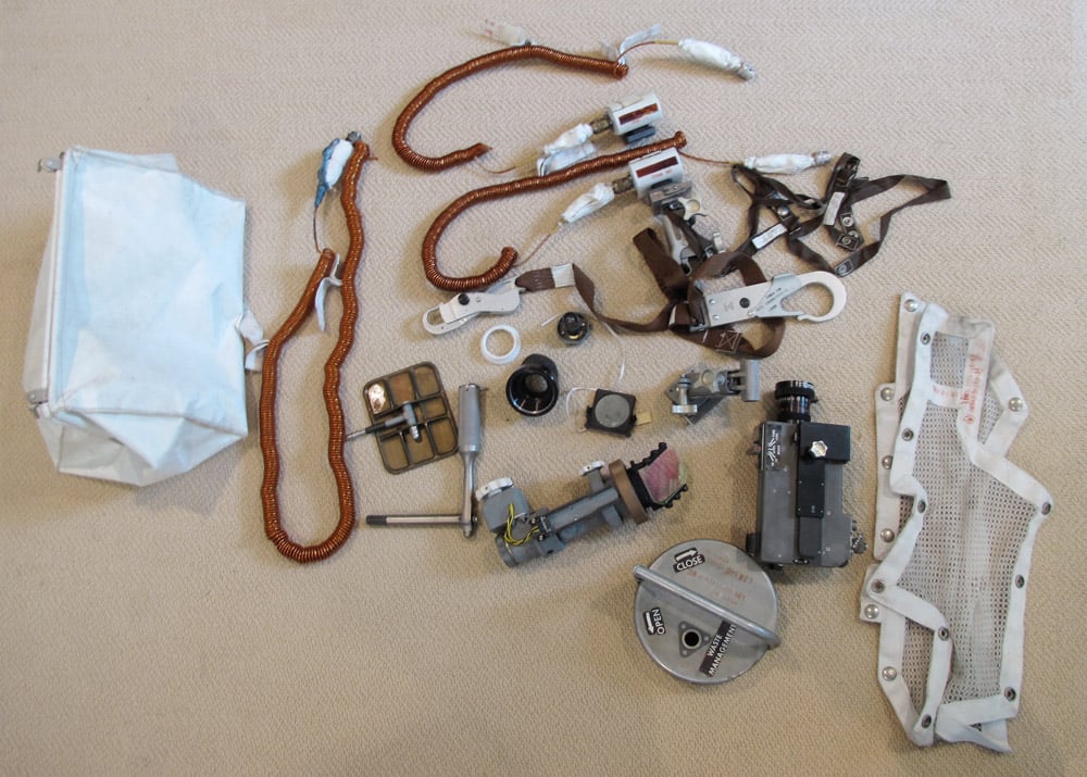 Among the items: a waist tether, utility lights, a mirror, and the camera that captured iconic images from the moon landing, like the planting of the US flag on its soil.