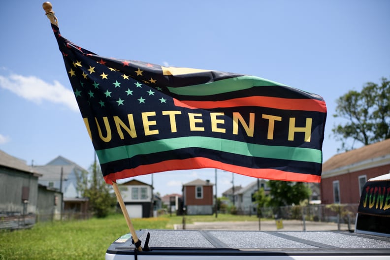 A Juneteenth flag flies on a float during the 45th annual Juneteenth National Independence Day celebrations in Galveston, Texas, on June 15