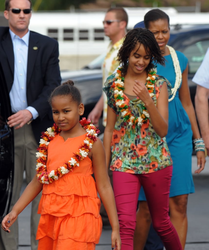 Michelle arrived with her daughters at the Hickam Air Force Base in Honolulu, HI, for their Christmas vacation in 2009.