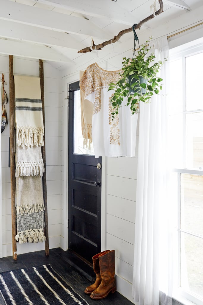 Sticking to a simple black-and-white color scheme gave the space a polished and cohesive look. Painting the walls and ceiling white also takes advantage of the abundance of natural light.  
Source: Cody Ulrich via Homepolish