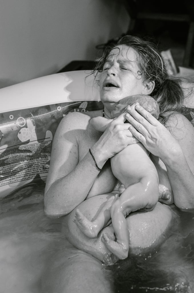 Mom Breastfeeding During Childbirth