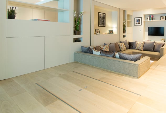 The area where the kitchen table is docked can be used as open space during nondining hours.