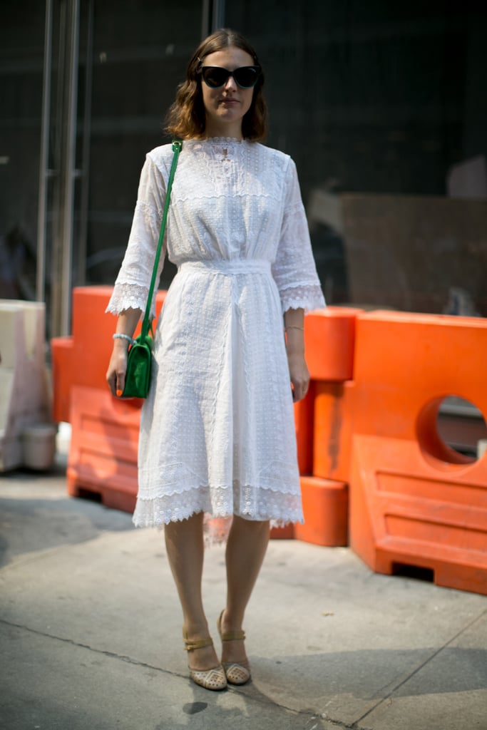 A bright green bag was a welcome pop of color against a pretty white dress.