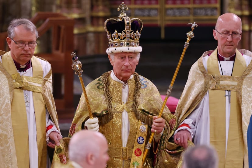 LONDON, ENGLAND - MAY 06:  King Charles III stands after being crowned during his coronation ceremony in Westminster Abbey, on May 6, 2023 in London, England. The Coronation of Charles III and his wife, Camilla, as King and Queen of the United Kingdom of 