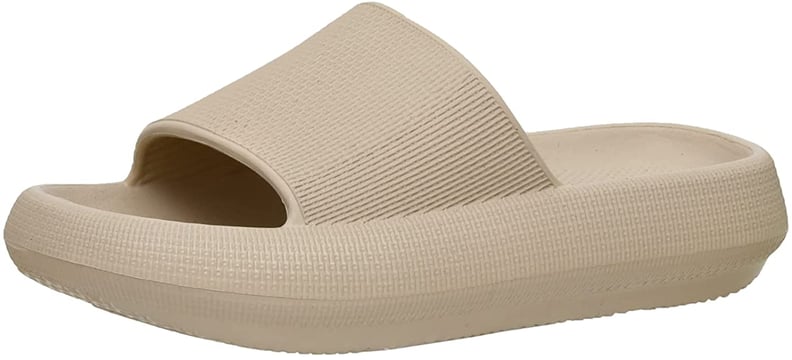For the Fashionista Who Loves Comfort: Cushionaire Women's Feather Recovery Cloud Slide Sandal