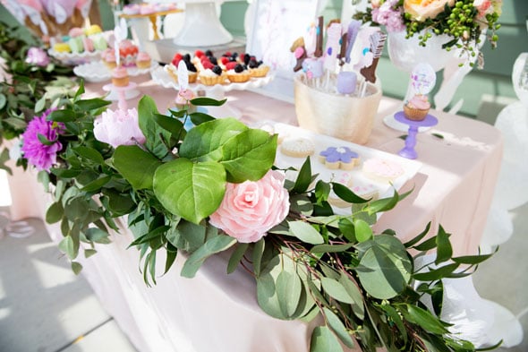 The gorgeous birthday banner was provided by Little Dovie. We absolutely love how it’s customized for this birthday girl and glittery letters are the absolute best for any birthday party! And those gorgeous flower garland pieces? Oh my! KMHallberg Design really outdid themselves with the exquisite flower creations that were placed around the birthday party.