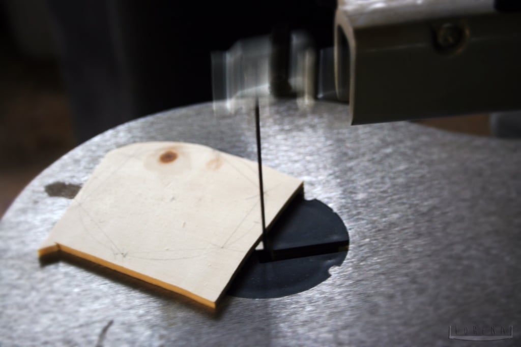 "The tiles were then cut into shape by the scroll saw, before being