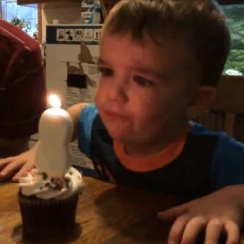 Kid Is Terrible at Blowing Out Candles