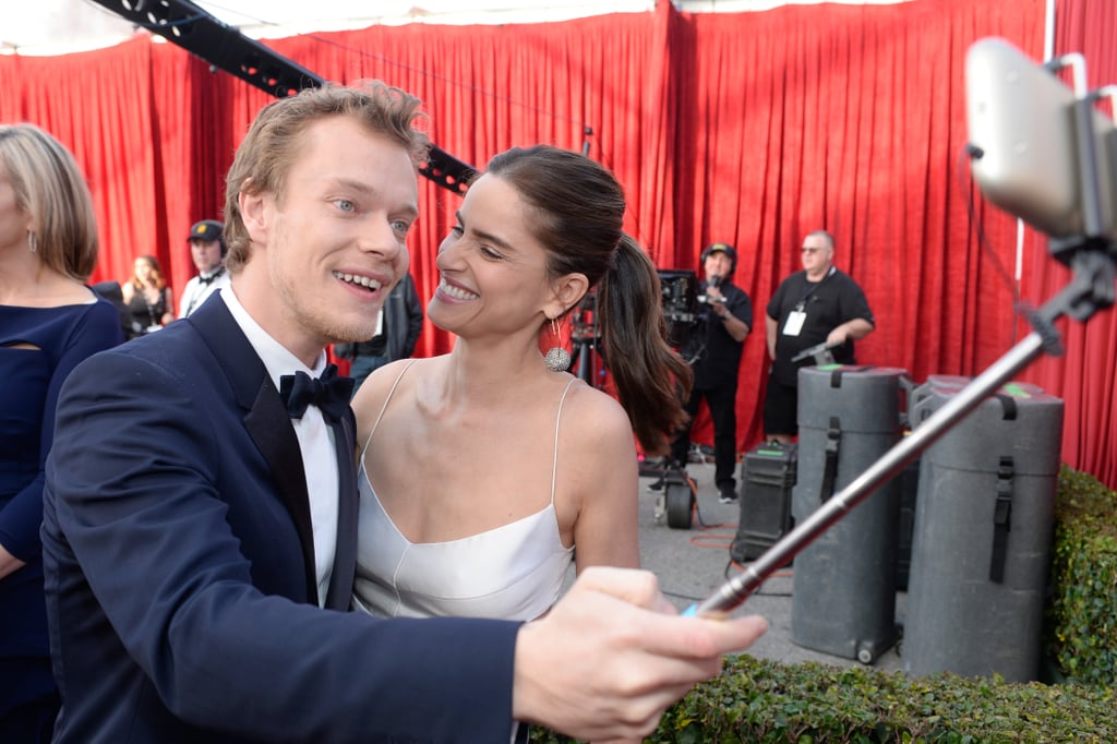 Pictured: Amanda Peet and Alfie Allen