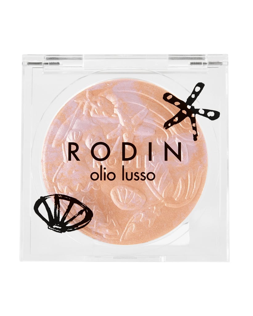 From the brand's mermaid collection, the Rodin Luxury Illuminating Powder in Siren ($50) is embossed with seashells and other beachy objects.