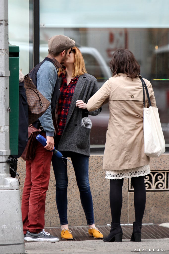 Andrew Garfield and Emma Stone shared a passionate kiss in NYC on Thursday.