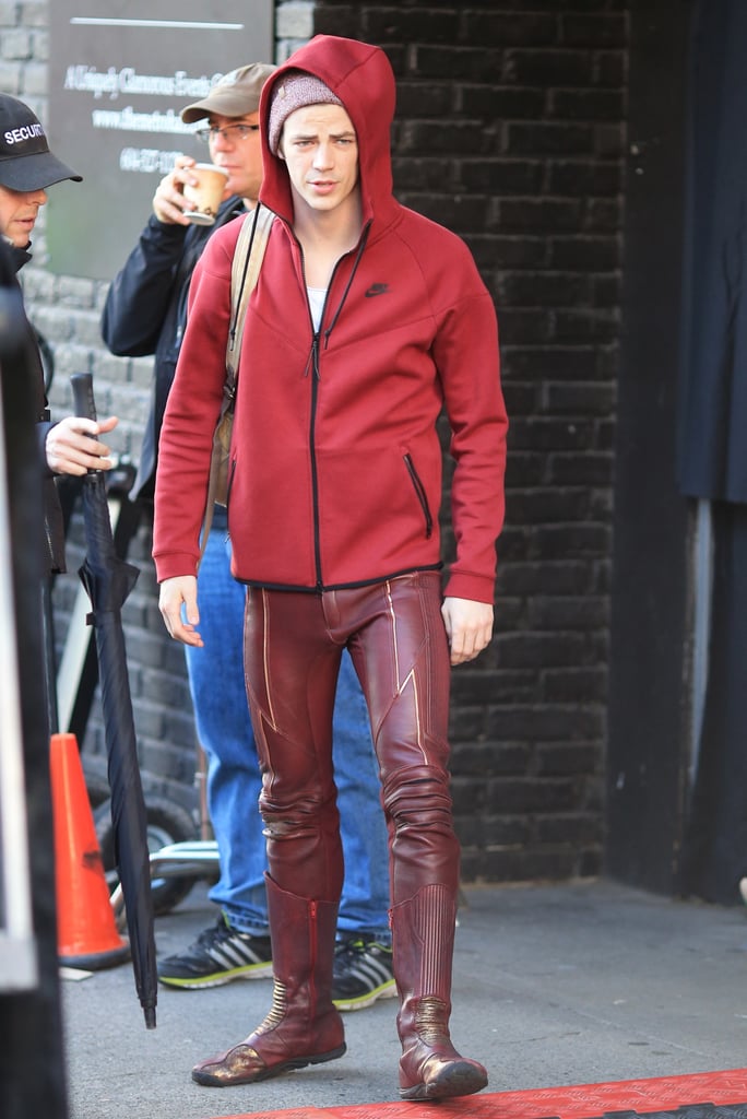 The Flash star Grant Gustin sported his sexy red costume while filming scenes in New Westminster, Canada, on Monday.
