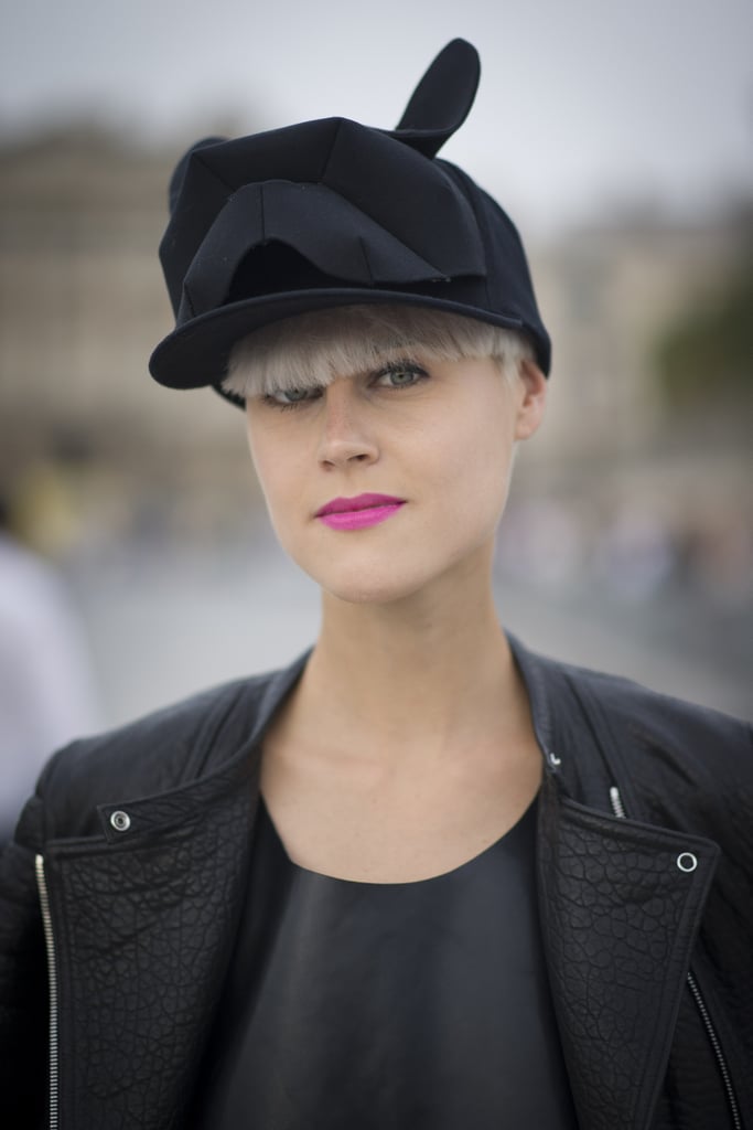 Bangs and a pixie look super edgy when paired with an oversized cap.